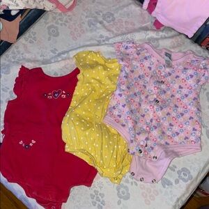 Stylish Red and Yellow Bodysuits for Warm Days